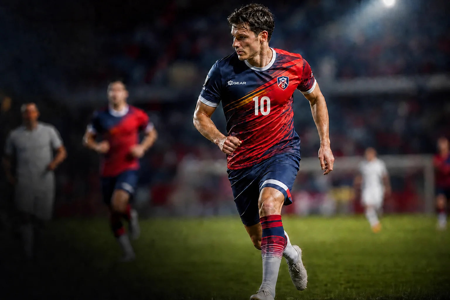 Soccer player wearing a red and navy number 10 custom uniform